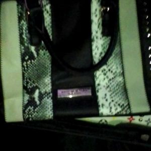 Marc New York black and white snakeskin handbag with leather shoulder strap.
